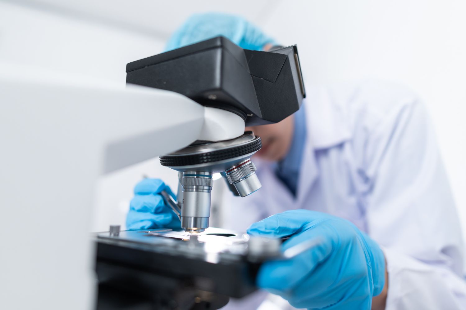 Person using a microscope